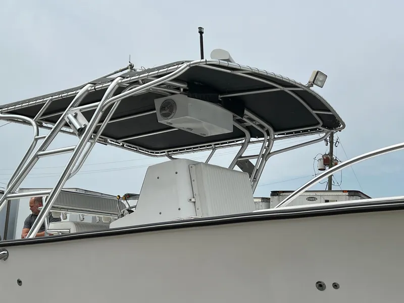 2000 Stuart Angler 32 Center Console boat with T-top and radar equipment.