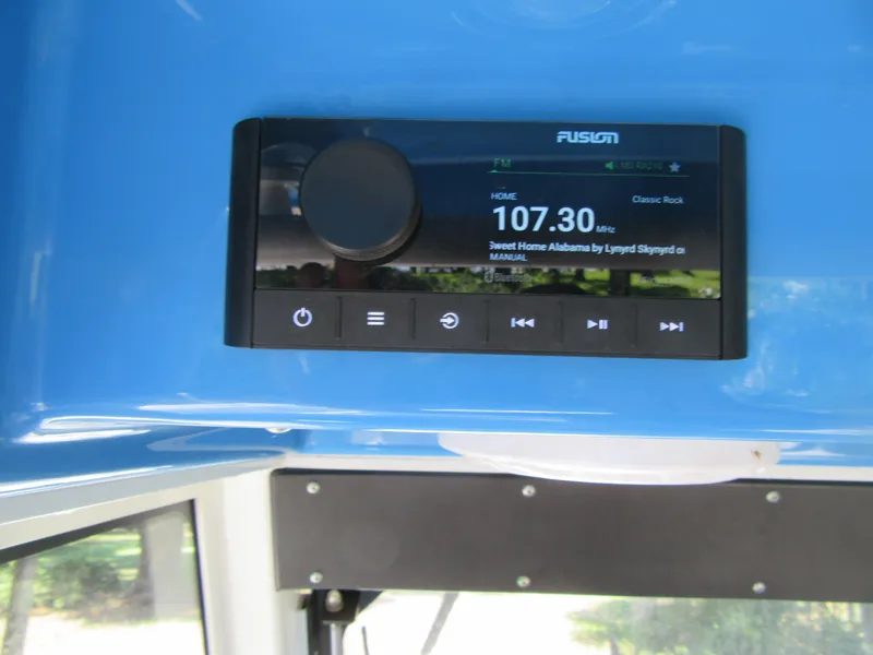 Fusion radio display on 2017 Everglades 255 Center Console boat, tuned to 107.3 MHz.
