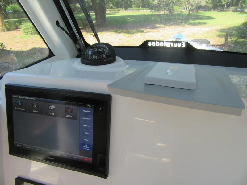 2017 Everglades 255 Center Console dashboard with Garmin display and compass.