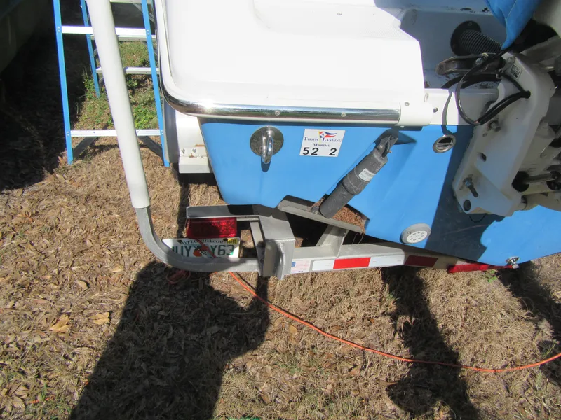 2017 Everglades 255 Center Console boat on trailer, rear view.