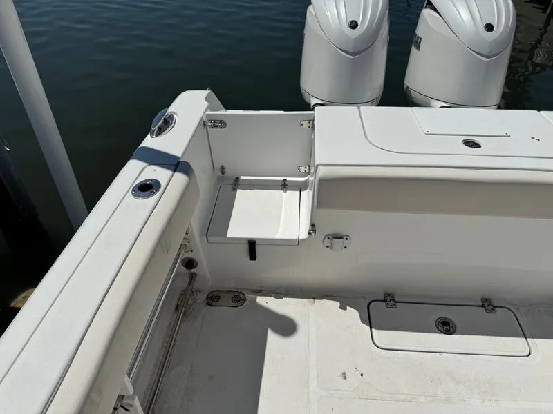 2024 Sea Hunt Gamefish 25 boat with engine view.