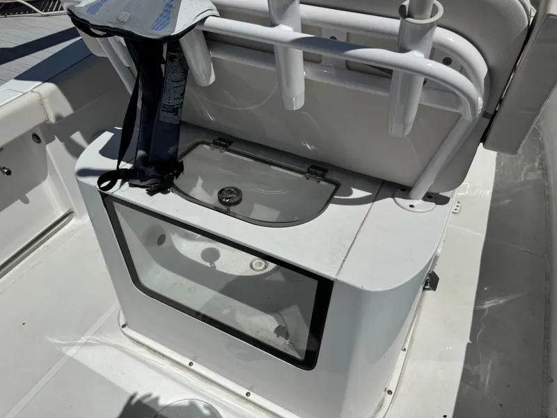 2024 Sea Hunt Gamefish 25 boat with fishing rod holder and storage.