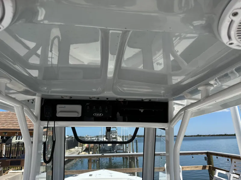 Interior view of a 2024 Sea Hunt Gamefish 25 boat with electronics.