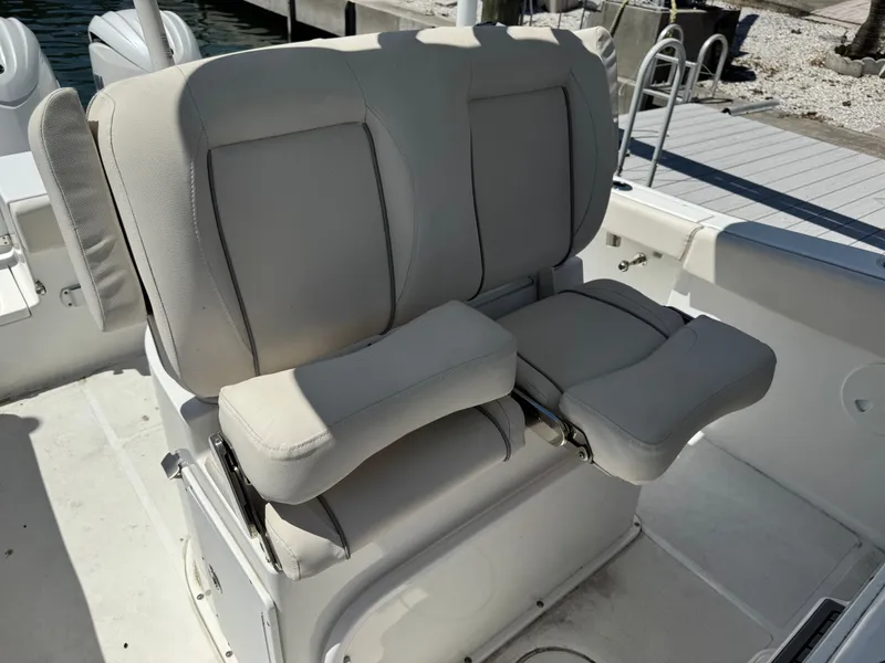 2024 Sea Hunt Gamefish 25 boat seat with cushioning.