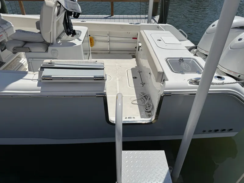 2024 Sea Hunt Gamefish 25 boat dock with engines.