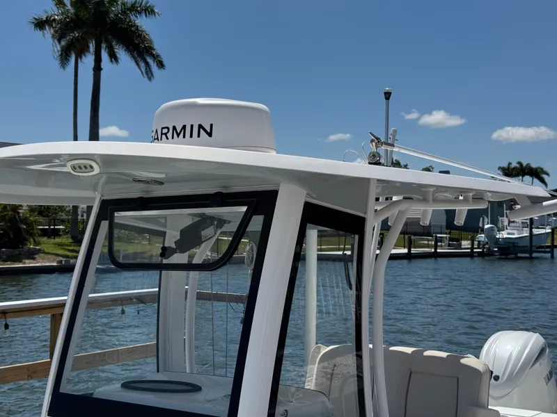 2024 Sea Hunt Gamefish 25 with Garmin equipment at the dock.