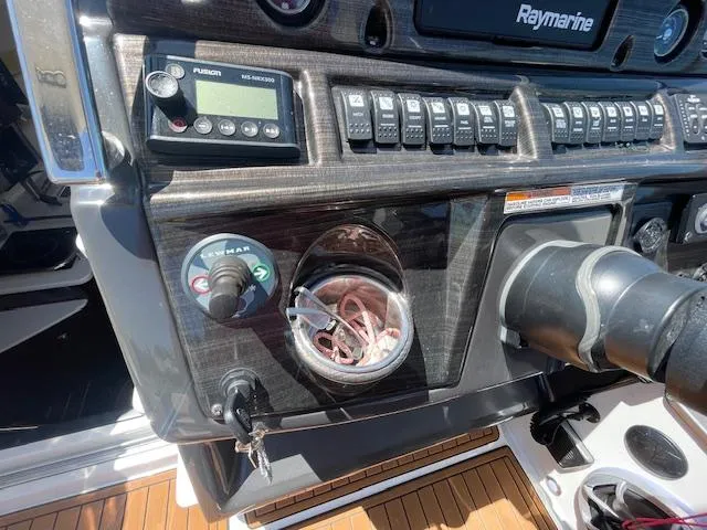 Control panel of a 2019 Monterey 295 boat with navigation and audio systems.