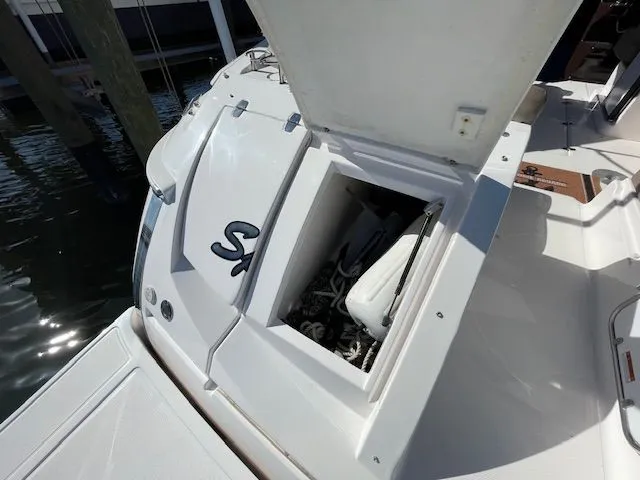 2014 Regal 3550 Cuddy with open rear storage compartment.