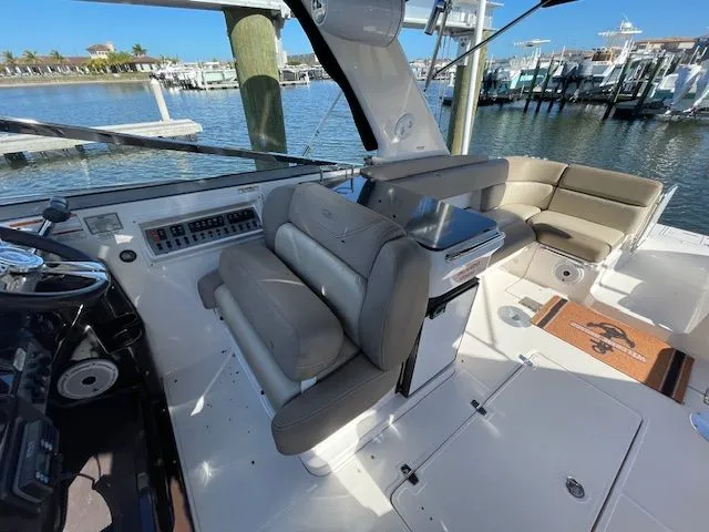 2014 Regal 3550 Cuddy boat interior with seating and controls.