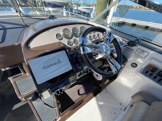 Cockpit of a 2014 Regal 3550 Cuddy with Garmin navigation system.