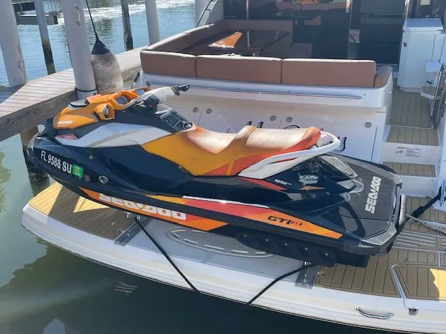 Jet ski on Sea Ray 510 DA yacht, year 2016.