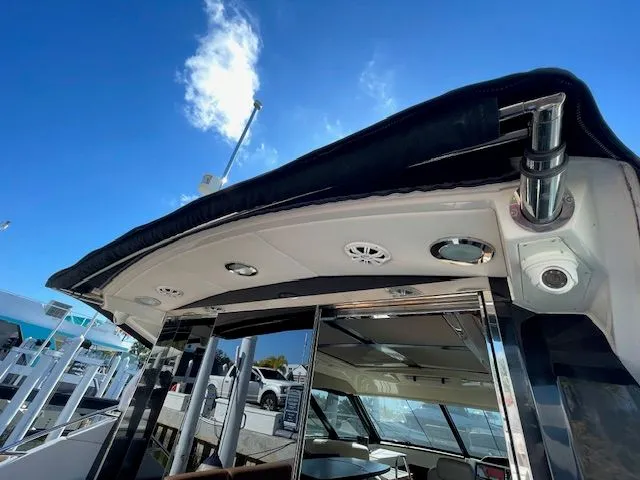 2016 Sea Ray 510 DA yacht with sleek design and blue sky.