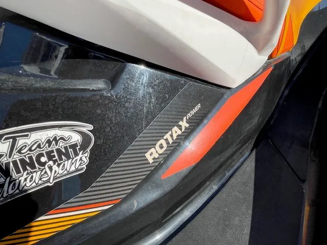 Close-up of a 2016 Sea Ray 510 DA with Rotax Power logo.