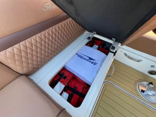 Storage compartment in 2016 Sea Ray 510 DA boat.