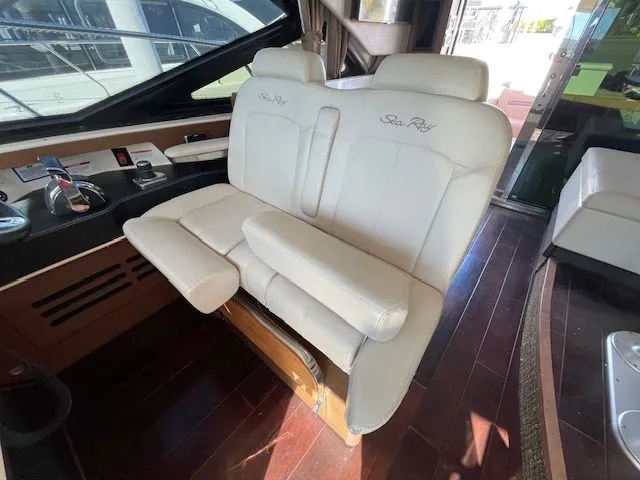 Interior of a 2016 Sea Ray 510 DA with white leather seats.
