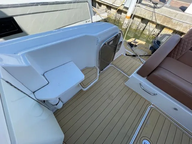 Interior of a 2016 Sea Ray 510 DA yacht with teak flooring.