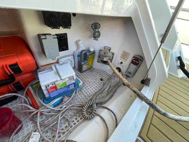 Storage area in Sea Ray 510 DA boat, year 2016.