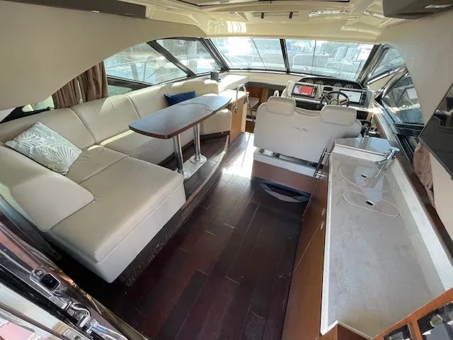 Interior of a 2016 Sea Ray 510 DA yacht with luxurious seating area.