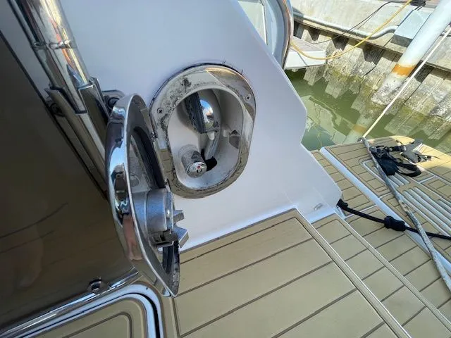 Close-up of a 2016 Sea Ray 510 DA yacht at the dock.