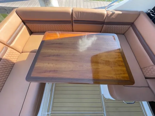 Luxurious seating area on a 2016 Sea Ray 510 DA yacht.