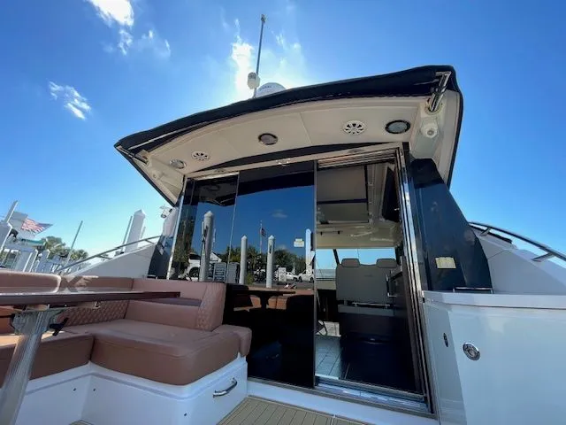 Sea Ray 510 DA 2016 yacht with open deck and blue sky.