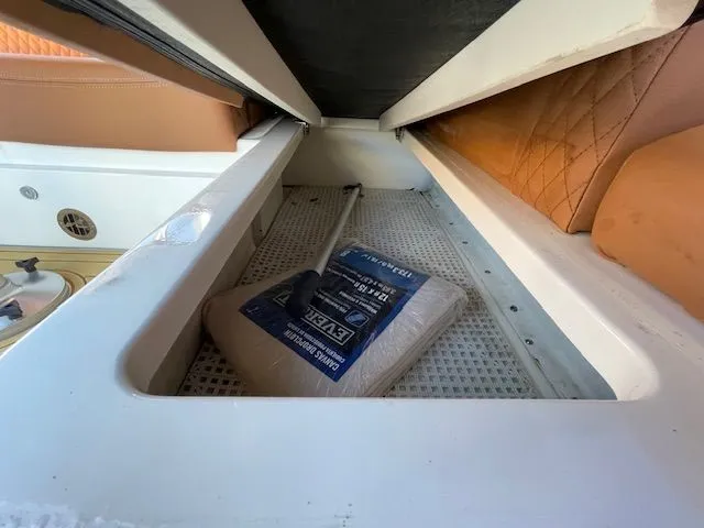 Storage compartment in 2016 Sea Ray 510 DA boat.