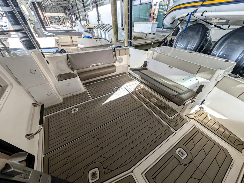 2022 Cutwater C-32 Coupe LE boat interior with seating and storage compartments.