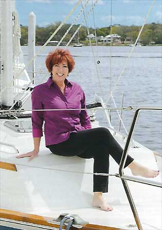 BARBARA BURKE on a sailboat